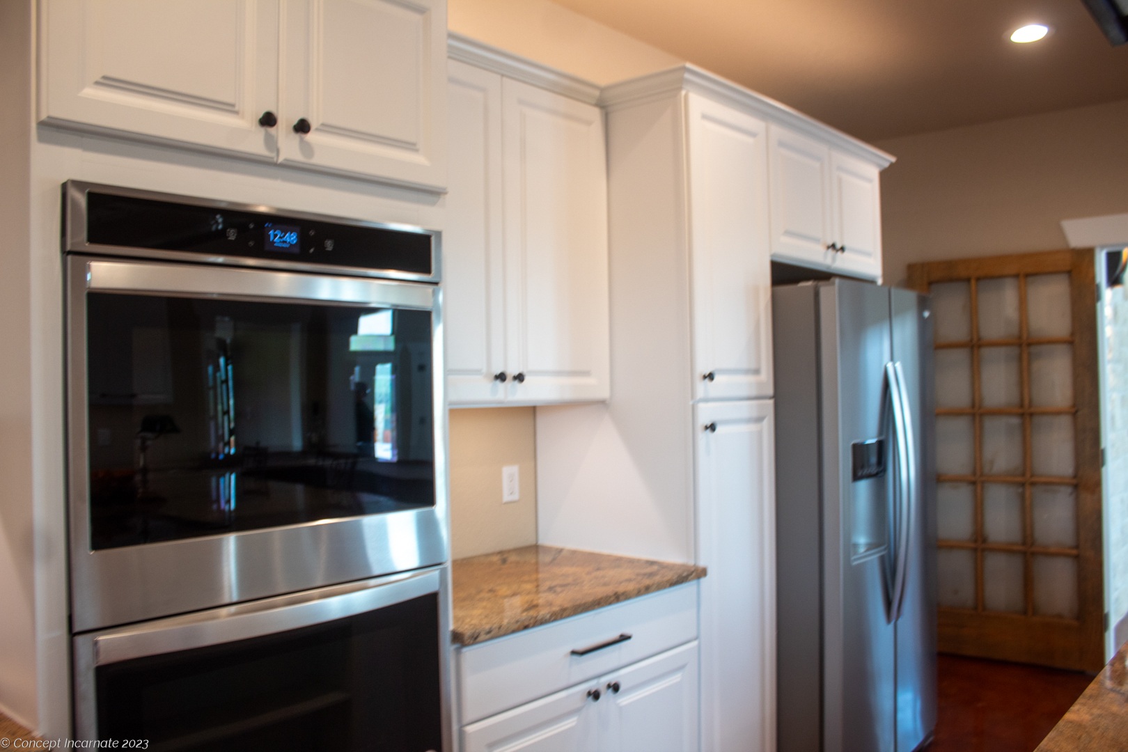 Double oven and stainless steel fridge at club house Double oven and stainless steel fridge at club house